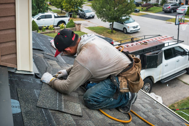 Professional Flat Roof Repair technician working in Brighton, IA